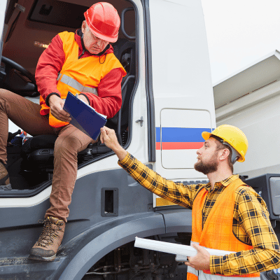 Construction Worker Getting Out Of Their Commercial Vehicle